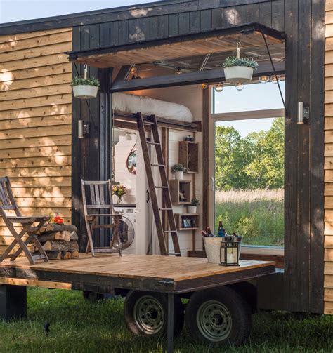 metal clad tiny house fold down deck wheels|metal tiny houses.